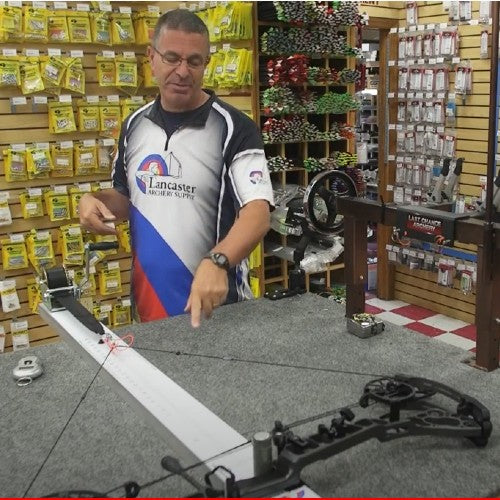 Every home archery shop needs a draw board