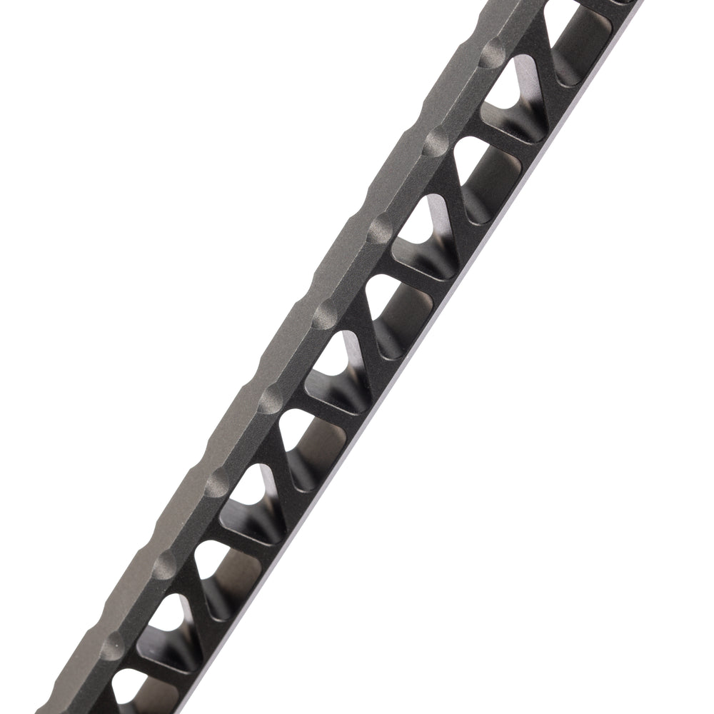 Mathews Bridge-Lock skeletonized stabilizer bar designed to integrate directly into a Mathews riser.