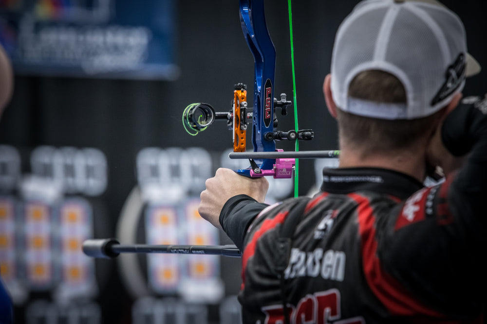 Stephan Hansen aims his bow at a vertical three spot during the Lancaster Archery Classic.