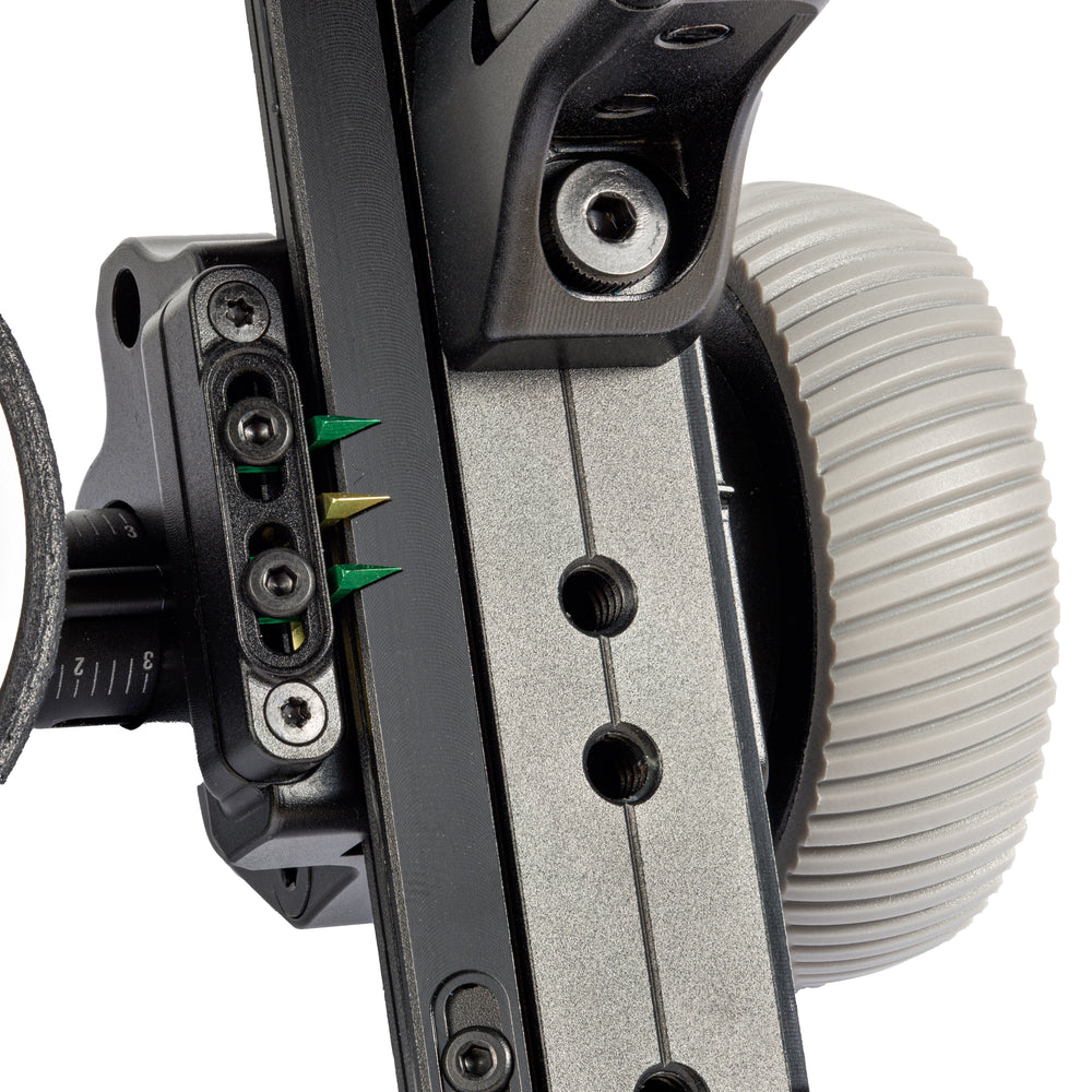 Close up image of the ULTRAVIEW UV Slider Triple Mark sight tape indicators, their adjustment screws, and the Dual-Dial  windage markings. 