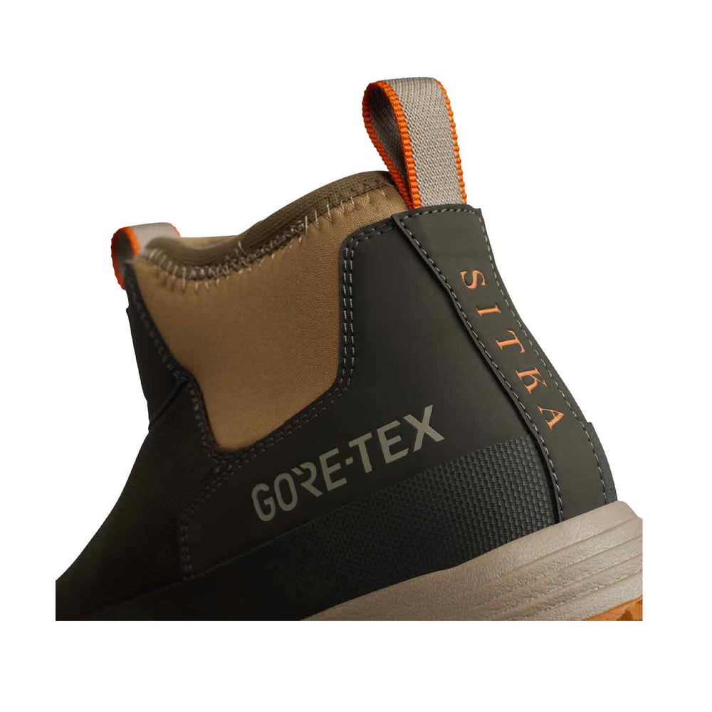 Gore-Tex hiking boot with brown and black design on a white background
