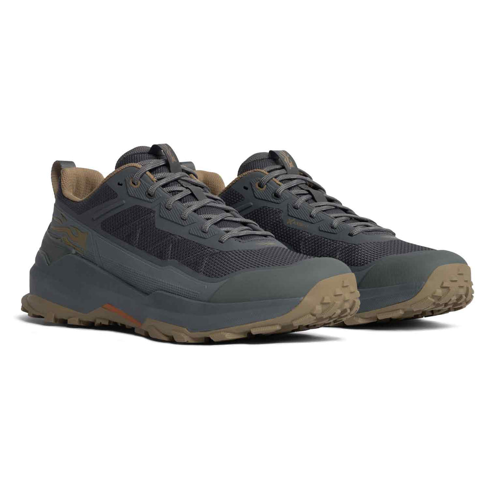 A pair of dark gray and brown hiking shoes with a rugged sole, shown from a three-quarters angle on a white background.