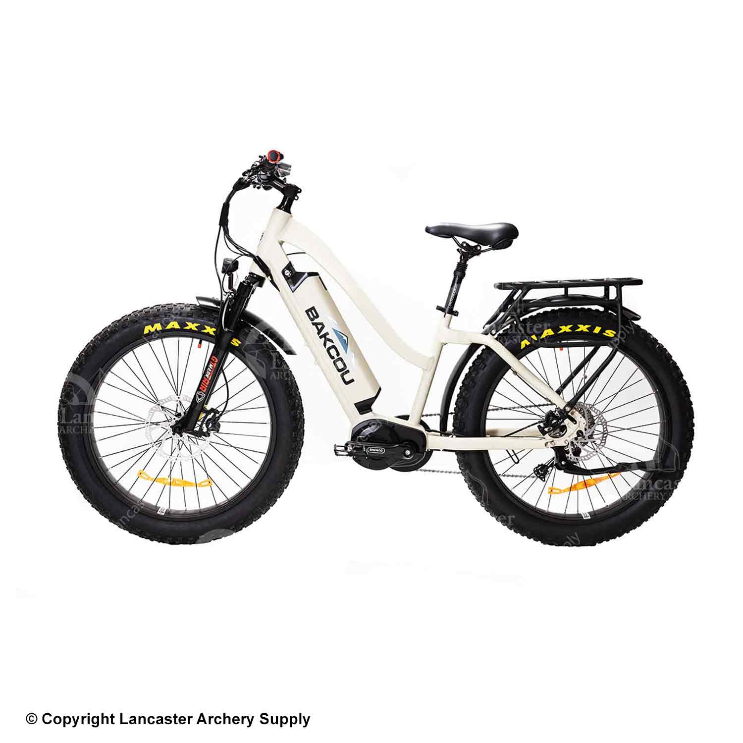 A sturdy and heavy-duty white mountain bike with powerful tires. 